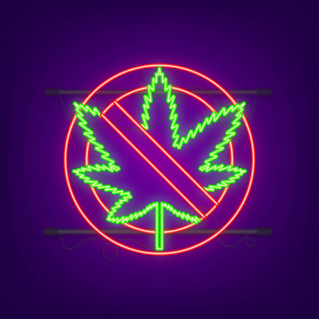 Neon-Plakat mit einem durchgestrichenen Marihuana-Blatt
